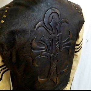 Wilsons 1999 fleur-de-lis freedom cross moto